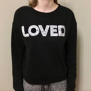 Betsy Johnson Performance Size L Black Sweatshirt,  “LOVED” written on front.